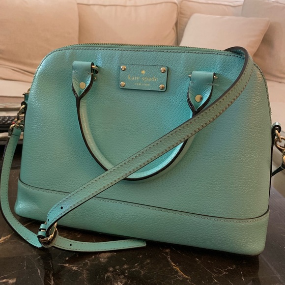 purse with shoulder strap and handles